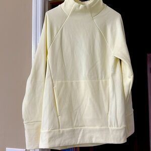 Fabletics Mock Turtleneck Sweatshirt, Cream, small. 1 front muffin pocket